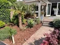 Boomschors als bescherming van uw tuin - Boomschors.nl